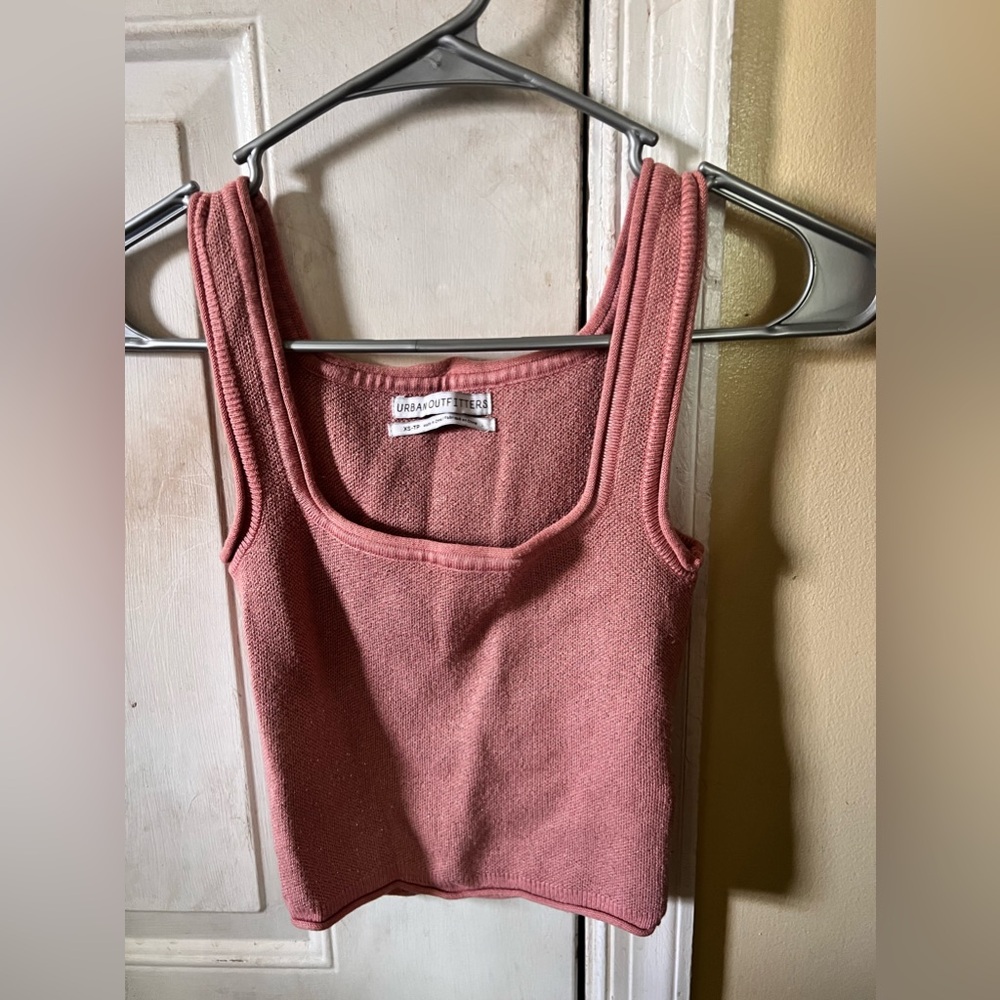 A pink crop top, it does fit like a Small. super cute but only worn once
